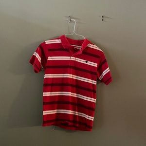 Red white and black striped polo style shirt.